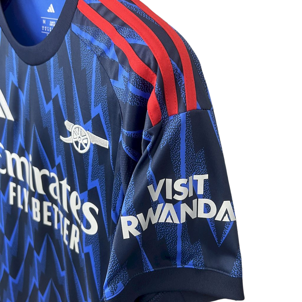 -camiseta-arsenal-away-25-26-azul- marinho-adidas-rice-champions-league-lancamento-europeu-