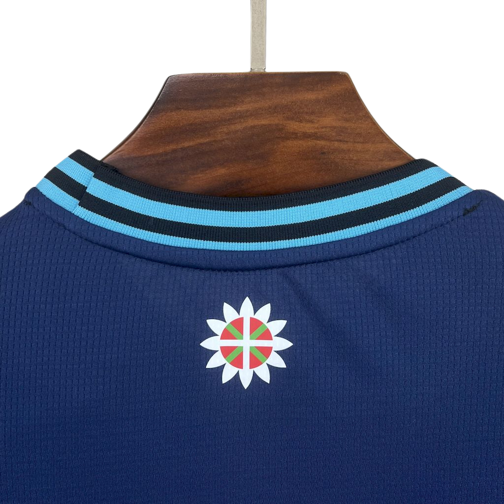camisa-atlhetic-bilbao-il-2025-26-torcedor-masculina-camiseta-champions-league-lancamento-europeu-segunda-away-oficial-kutxabank-castore-azul-escuro-azul-claro-gola-azul-manga-azul
