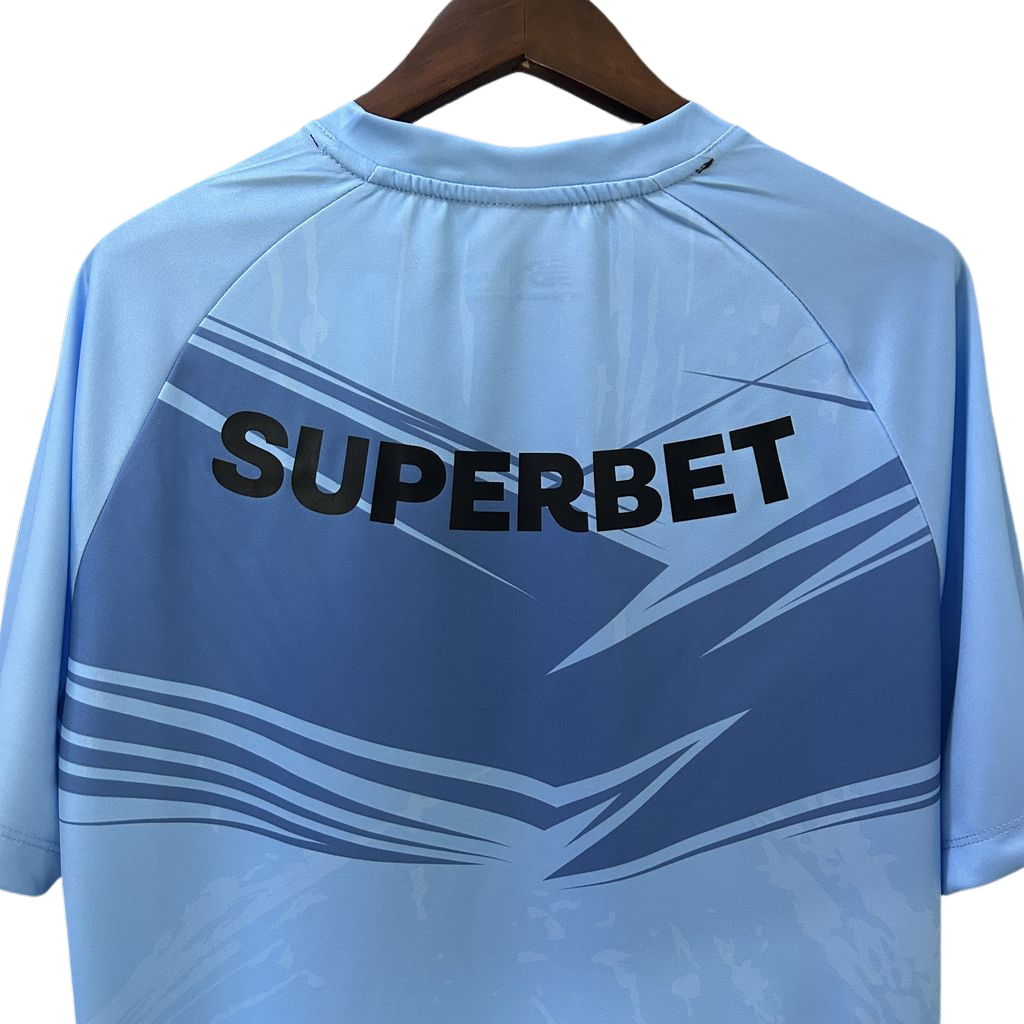 camisa-sao-paulo-2025-26-treino-torcedor-masculina-azul-celeste-claro-camiseta-lancamento-ademicon-new-balance-superbet